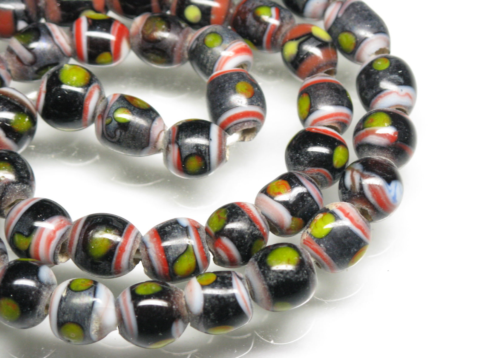 TOKO-BEADS |AG106-25N とんぼ玉（連/在庫限り） 7~8.5mm