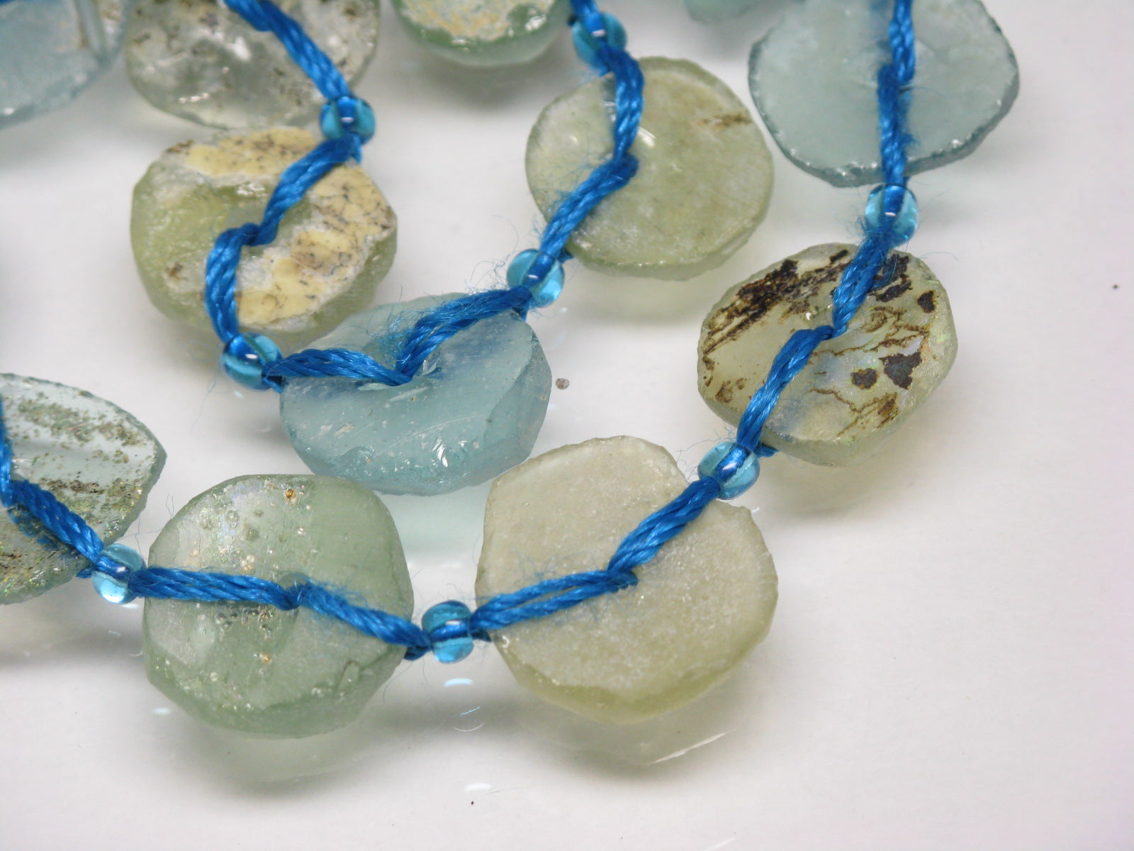 TOKO-BEADS |RG102-04N 円盤型ローマングラス（連 21個) 13~18mm