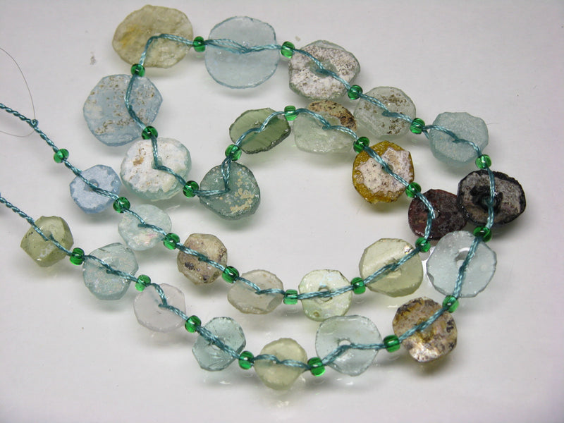 TOKO-BEADS RG102-05N Disk-shaped Roman glass (strand 27pcs) 9~17mm RG102-05N 円盤型ローマングラス（連 27個) 9~17mm Asian bead & African bead  Handmade,Lampeork,bead,asia,india,ethnic,parts,accessory,beads とんぼ玉,ビーズ,トンボ玉,アジア,インド,エスニック,手作り,パーツ,アクセサリー