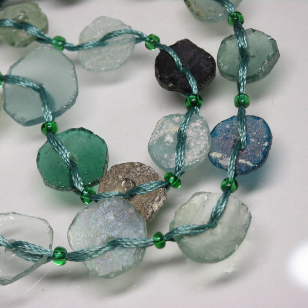 TOKO-BEADS |RG102-11N 円盤型ローマングラス（連 23個) 9~17mm