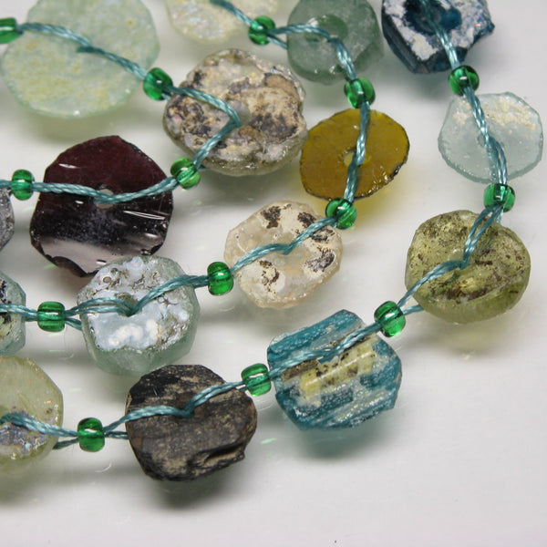TOKO-BEADS |RG102-13N 円盤型ローマングラス（連 26個) 9~16.5mm