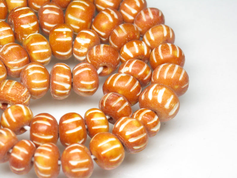 | TOKO-BEADS |AB185-20 ボーンビーズ（連） 7.5~10.5mmとんぼ玉,ビーズ,トンボ玉,アジア,インド,エスニック,手作り,パーツ,アクセサリー