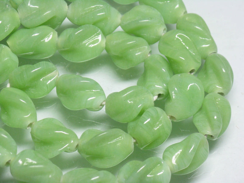 | TOKO-BEADS |AG087N-11 トゥイストビーズ（連） 11~13mmとんぼ玉,ビーズ,トンボ玉,アジア,インド,エスニック,手作り,パーツ,アクセサリー