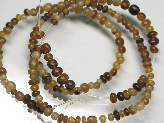 | TOKO-BEADS |HR010-12 ホーンビーズ（連） 2.5~4mmとんぼ玉,ビーズ,トンボ玉,アジア,インド,エスニック,手作り,パーツ,アクセサリー