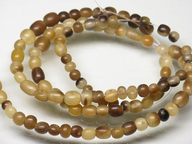 | TOKO-BEADS |HR010-21 ホーンビーズ（連） 3.5~4.5mmとんぼ玉,ビーズ,トンボ玉,アジア,インド,エスニック,手作り,パーツ,アクセサリー