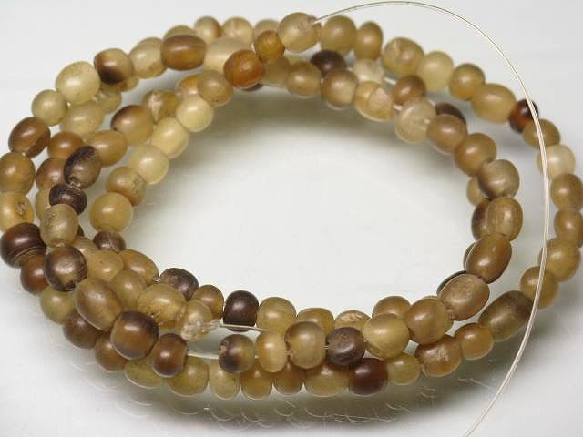 | TOKO-BEADS |HR010-22 ホーンビーズ（連） 3~4mmとんぼ玉,ビーズ,トンボ玉,アジア,インド,エスニック,手作り,パーツ,アクセサリー