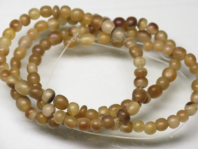 | TOKO-BEADS |HR010-25 ホーンビーズ（連） 3.5~4mmとんぼ玉,ビーズ,トンボ玉,アジア,インド,エスニック,手作り,パーツ,アクセサリー