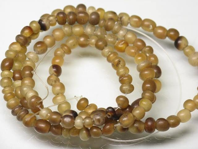 | TOKO-BEADS |HR010-27 ホーンビーズ（連） 3~3.5mmとんぼ玉,ビーズ,トンボ玉,アジア,インド,エスニック,手作り,パーツ,アクセサリー