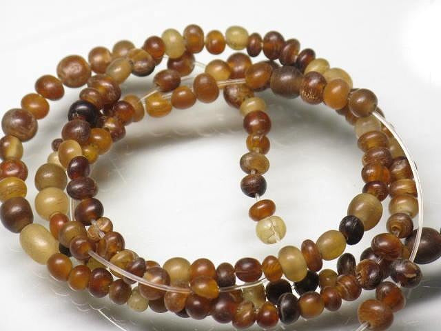 | TOKO-BEADS |HR010-34 ホーンビーズ（連） 3~4mmとんぼ玉,ビーズ,トンボ玉,アジア,インド,エスニック,手作り,パーツ,アクセサリー