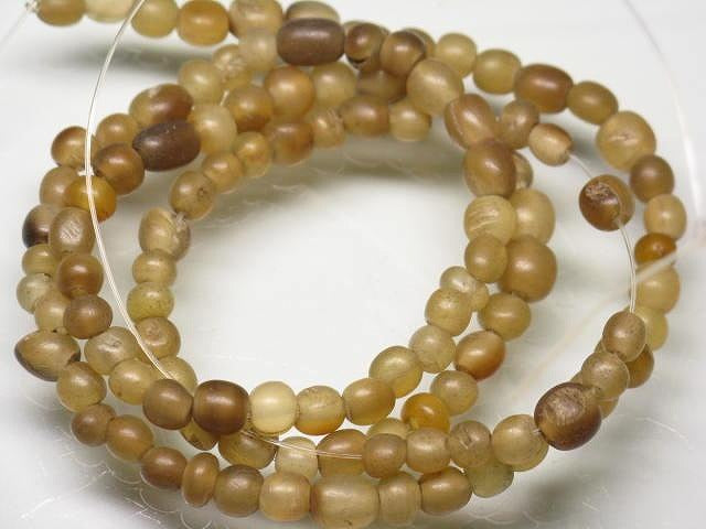 | TOKO-BEADS |HR010-37 ホーンビーズ（連） 3.5~4.5mmとんぼ玉,ビーズ,トンボ玉,アジア,インド,エスニック,手作り,パーツ,アクセサリー