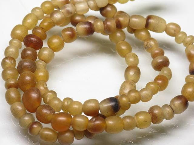 | TOKO-BEADS |HR010-38 ホーンビーズ（連） 4.5~5.5mmとんぼ玉,ビーズ,トンボ玉,アジア,インド,エスニック,手作り,パーツ,アクセサリー