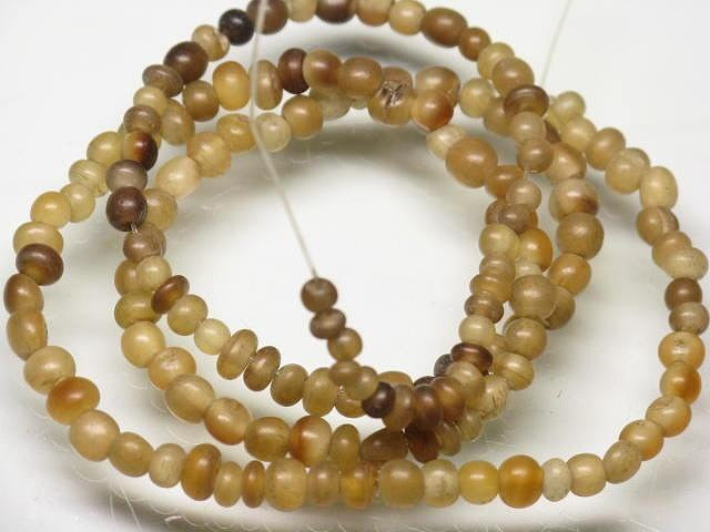 | TOKO-BEADS |HR010-39 ホーンビーズ（連） 3~4mmとんぼ玉,ビーズ,トンボ玉,アジア,インド,エスニック,手作り,パーツ,アクセサリー