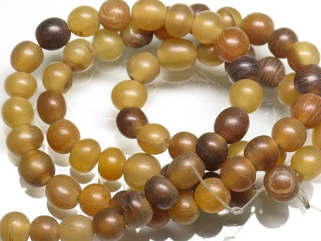 | TOKO-BEADS |HR010-45 ホーンビーズ（連） 5.5~6.5mmとんぼ玉,ビーズ,トンボ玉,アジア,インド,エスニック,手作り,パーツ,アクセサリー