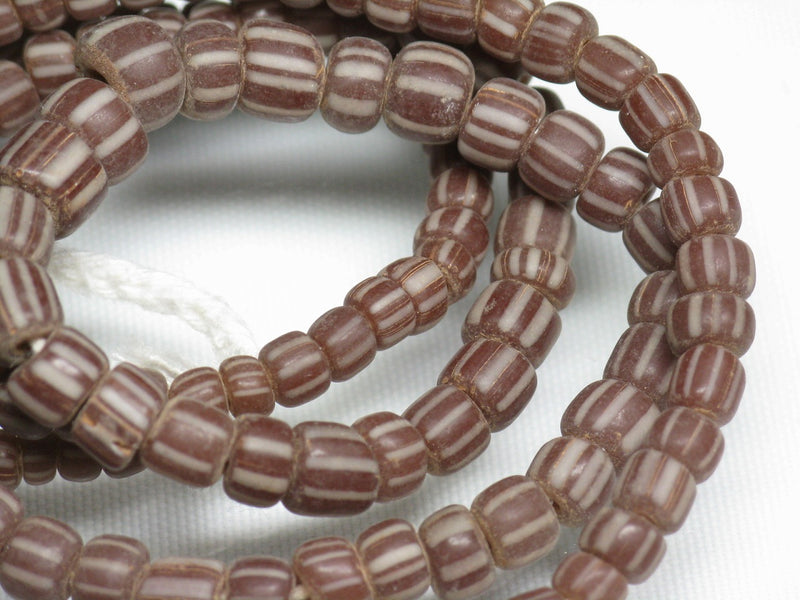 | TOKO-BEADS |MJ100-70 マジャパヒト玉（連） 4~7mmとんぼ玉,ビーズ,トンボ玉,アジア,インド,エスニック,手作り,パーツ,アクセサリー