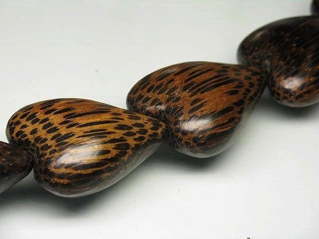 PW305N-10 Palm wood bead (strand) 28mm