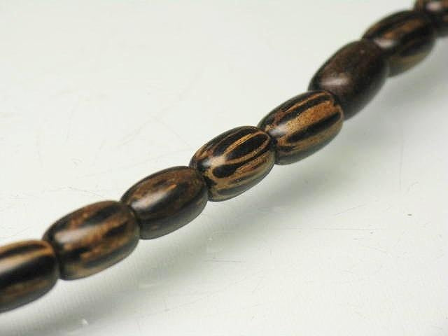 PW305N-18 Palm wood beads (strand) 5mm