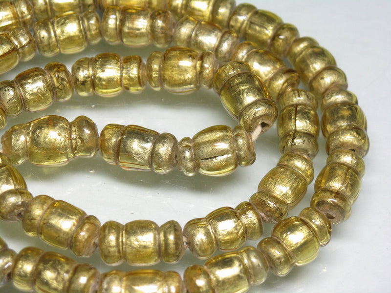 TOKO-BEADS T151N-11 Gold Sandwich bead(strand)  7.5~8.5mm T151N-11 ゴールドサンドイッチ玉（連） 7.5~8.5mmLoose Kazuri カズリビーズ Asian bead & African bead  Handmade,Lampeork,bead,asia,india,ethnic,parts,accessory,beads とんぼ玉,ビーズ,トンボ玉,アジア,インド,エスニック,手作り,パーツ,アクセサリー