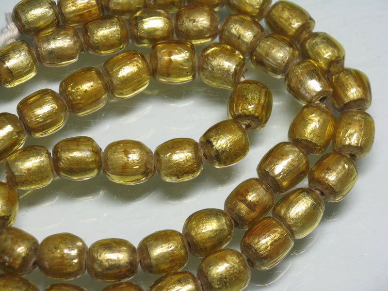 | TOKO-BEADS |T151N-14 ゴールドサンドイッチ玉（連） 9~9.5mmとんぼ玉,ビーズ,トンボ玉,アジア,インド,エスニック,手作り,パーツ,アクセサリー